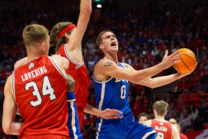 BYU forward Noah Waterman shoots during game against the Utah at Jon M. Huntsman Center in Salt Lake City, Dec. 9, 2023.