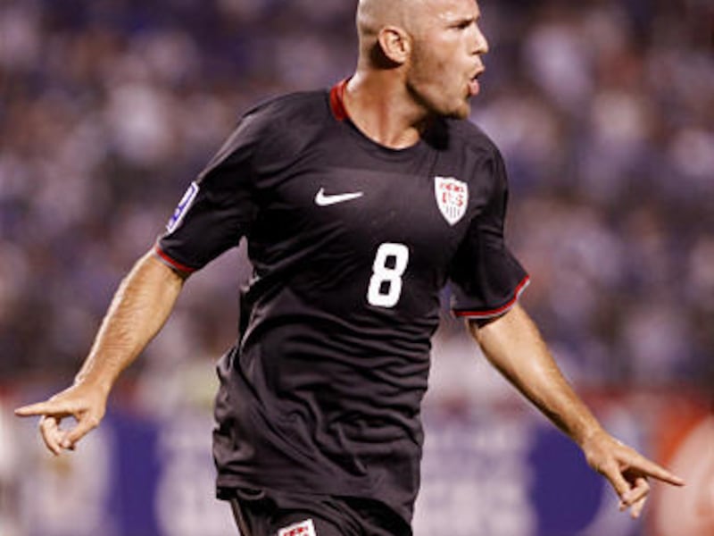 Conor Casey celebrates after scoring one of his two goals Saturday.