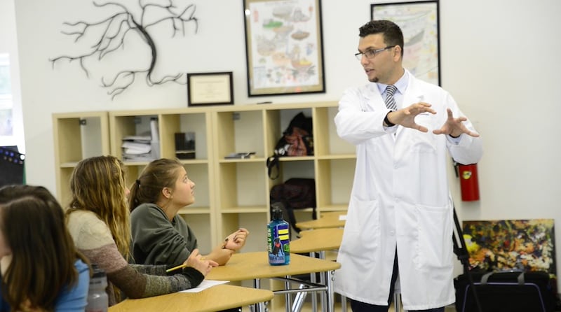 Dr. Heval Mohamed Kelli talks to high school students about careers in medicine. He is the founder and executive director of the Young Physicians Initiative, which provides mentors and information for teens considering medical careers.