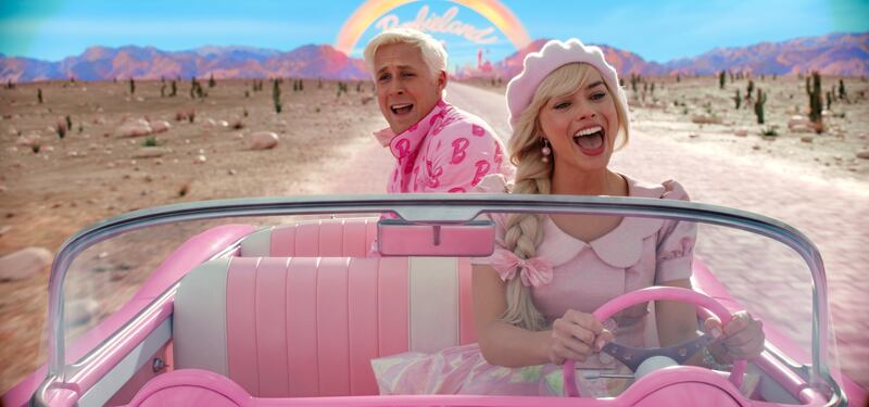 Ryan Gosling as Ken and Margot Robbie as Barbie in Warner Bros. Pictures’ “Barbie,” a Warner Bros. Pictures release.