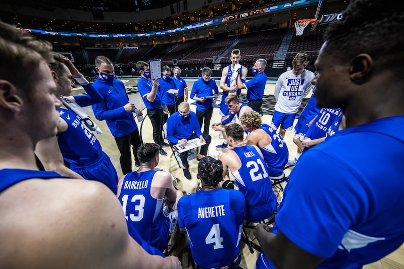 BYU basketball coach Mart Pope draws up a play during conference tournament title game against Gonzaga in Las Vegas.
