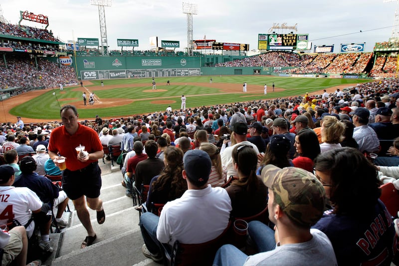 Fans at Fenway Park watch part of a baseball game between the Boston Red Sox and the Florida Marlins in Boston in 2009.