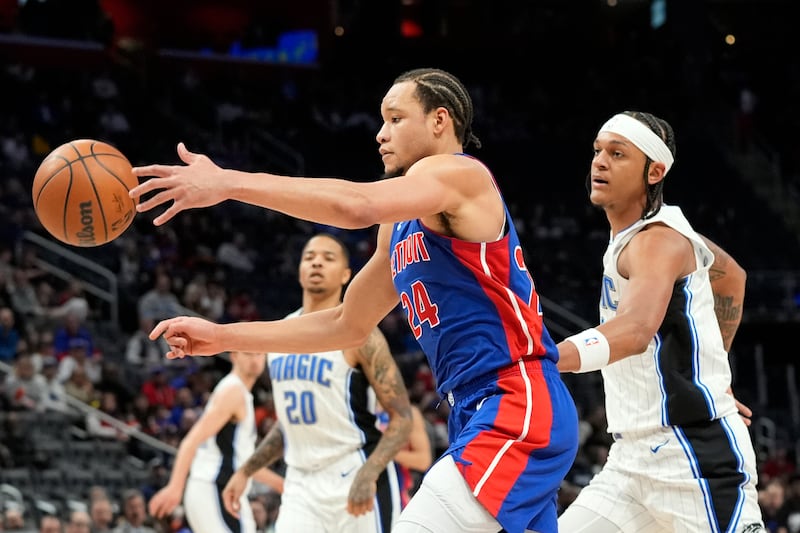 Detroit Pistons forward Kevin Knox II (24) reaches for the rebound during a game against the Orlando Magic, Sunday, Feb. 4, 2024.