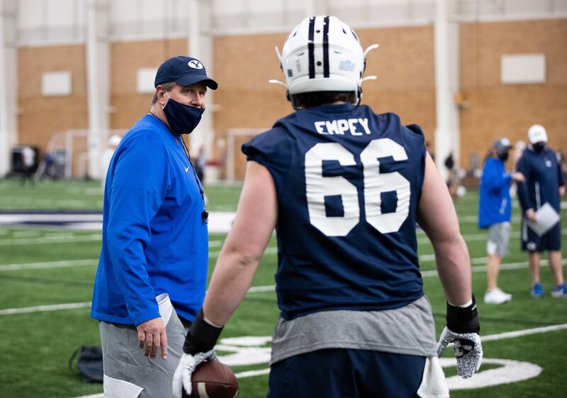 BYU offensive line coach Darrell Funk coaches at BYU’s indoor practice facility during 2021 spring camp in Provo, Utah.