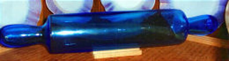 This medium-blue glass rolling pin was made in the early 20th century and is worth about $200.