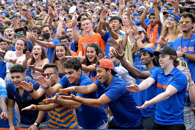 Florida fans cheer in the stands during the second half of an NCAA college football game against Alabama, Saturday, Sept. 18, 2021, in Gainesville, Fla. (AP Photo/Phelan M. Ebenhack)