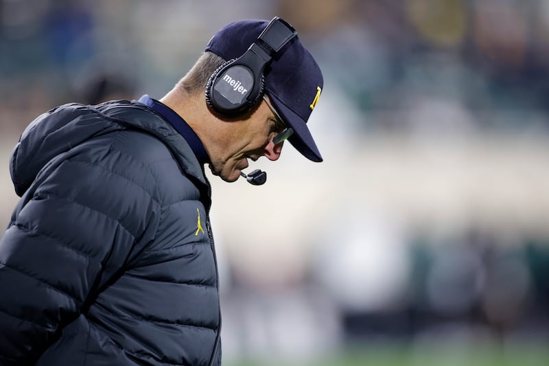 Michigan coach Jim Harbaugh reacts during game against Michigan State, Saturday, Oct. 21, 2023, in East Lansing, Mich.
