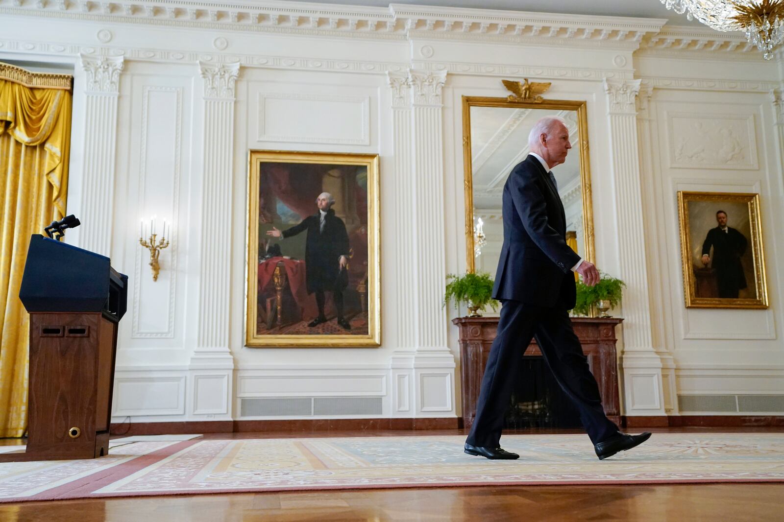 President Joe Biden walks from the podium after speaking about Afghanistan from the East Room of the White House on Monday.