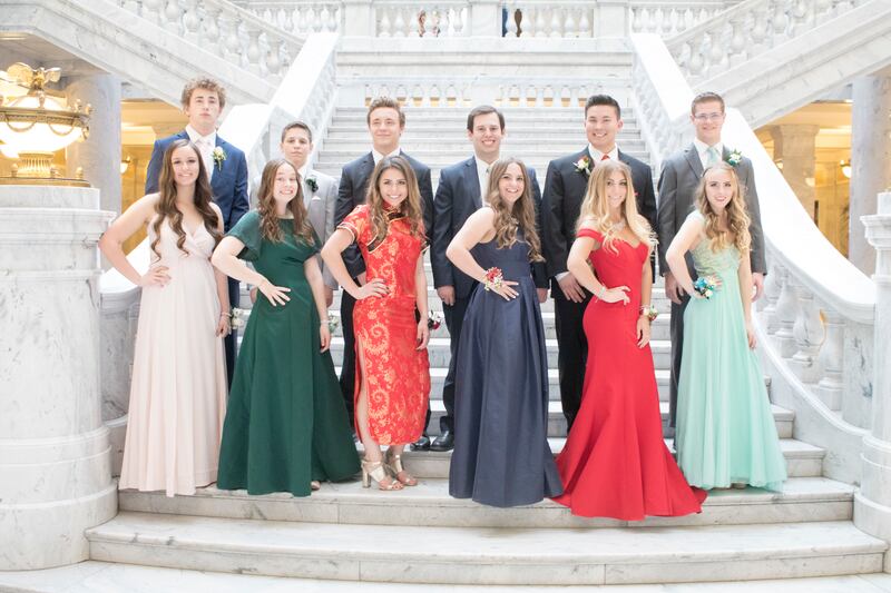 A group poses for a prom photo at the state Capitol in Salt Lake City on April 21, 2018.