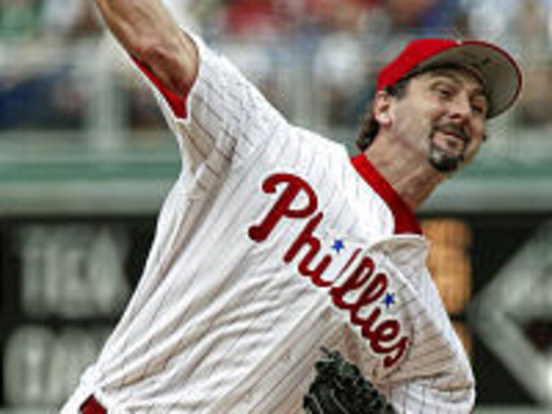 Pitcher Paul Abbott got his first win with the Phillies and drove in two runs against the Cubs.