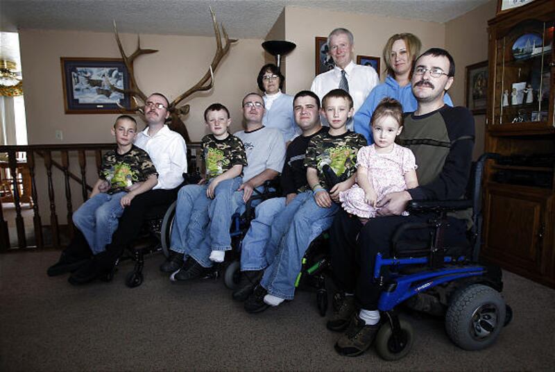 A benefit was recently held in Rexburg, Idaho, to assist the Clark family. Rick and Ruth Clark's four sons have muscular dystrophy. The family is, front row from left: Weston, Chris, Tre, Lael, Russ, Tyrel, Taelor and Ben; back row from left, Ruth, Rick a