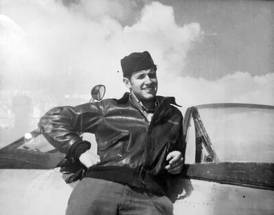 Bob Sharp with his P-47 during the World War II.