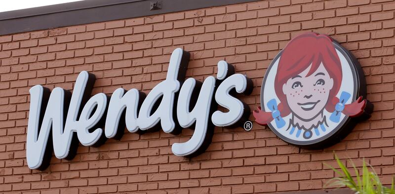 Photo shows a Wendy’s sign at a restaurant in Miami.
