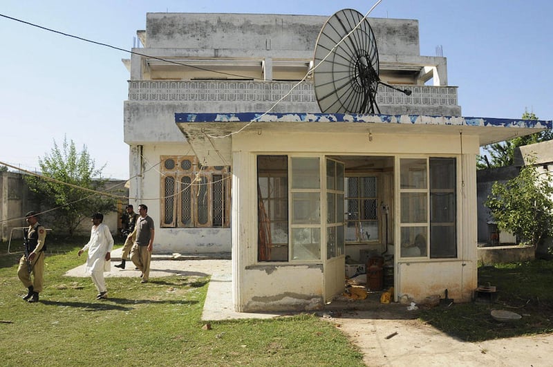 FILE - This Nov 18, 2011 file photo shows the guesthouse inside Osama bin Laden's compound in Abbottabad, Pakistan. A widow of Osama bin Laden has told investigators that the al-Qaida leader lived in five safe houses while on the run in Pakistan and fathe