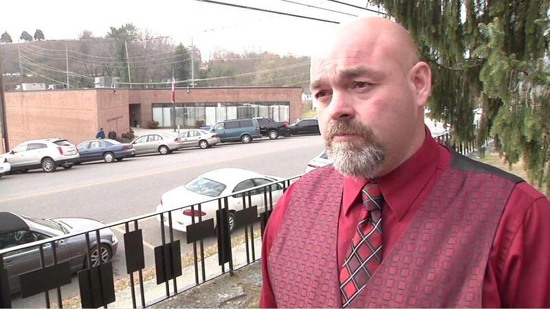 This image, made from a video provided by WATE, shows Jamie Coots, a pastor, who appeared on the National Geographic television reality show "Snake Salvation," in Knoxville, Tenn. Coots died Sunday, Feb. 16, 2014, after being bitten by a snake.