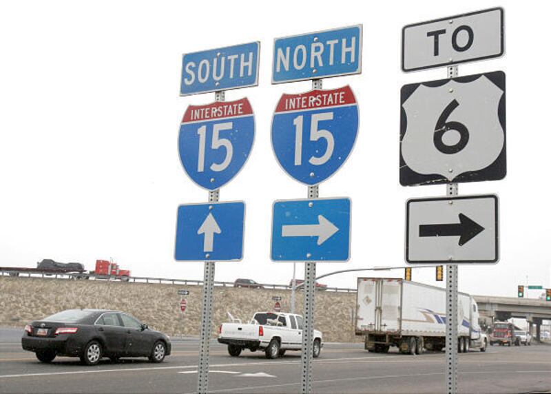 Cars take the onramp to I-15 and state Highway 6 in Spanish Fork.
