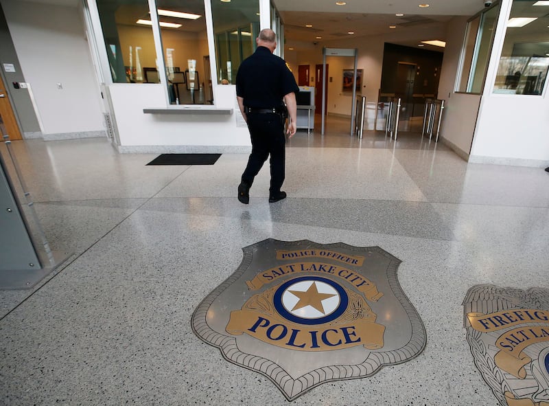 Salt Lake City police detective Greg Wilking walks through the Public Safety Building lobby in Salt Lake City on Tuesday, Jan. 30, 2018. The department wants to hire 50 officers amid a statewide candidate shortage.