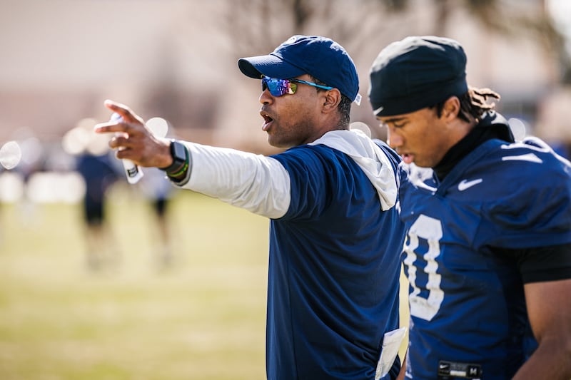 BYU's new cornerbacks coach Lewis Walker coaches during spring practice in Provo on March, 12, 2026.