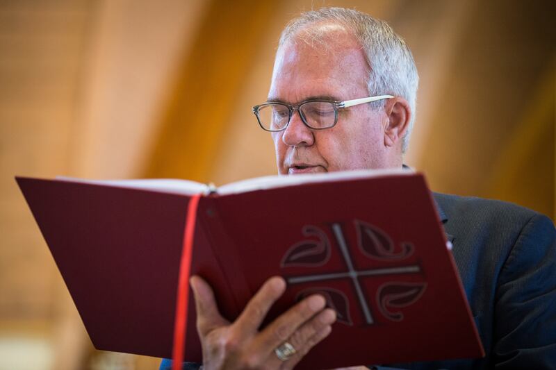 The Rev. Steve Klemz reads from his notes during worship services at Zion Evangelical Lutheran Church in Salt Lake City on Sunday, Nov. 4, 2018.