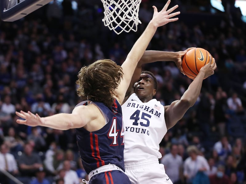 BYU center Fousseyni Traore drives on Saint Mary’s Gaels guard Alex Ducas in Provo on Saturday, Jan. 8, 2022.