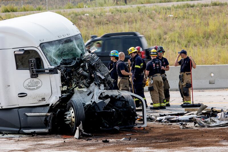 Emergency crews respond to a fatal semitrailer accident on state Route 201 at 5600 West in West Valley City on Aug. 30, 2021.