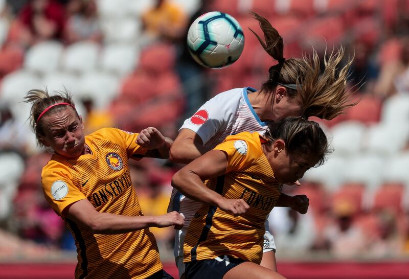 Utah Royals FC midfielder Gunnhildur Jonsdottir, Houston Dash midfielder Christine Nairn and Utah Royals FC midfielder Lo'eau LaBonta all go up for a header at Rio Tinto Stadium in Sandy on Saturday, May 11, 2019.