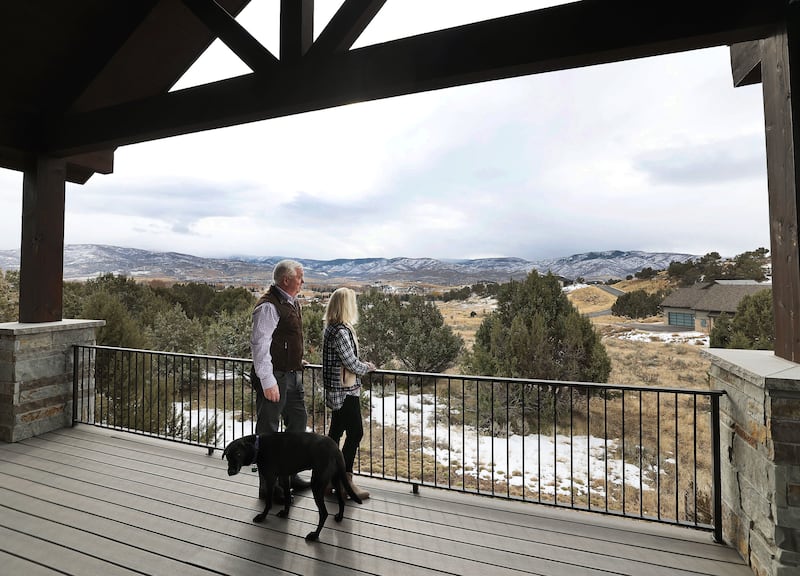 George Glass, former U.S. ambassador to Portugal, and his wife, Mary, look over the view at their home in Heber City on Dec. 20, 2023. George Glass, a Catholic, supports construction of a Latter-day Saint temple near his home.