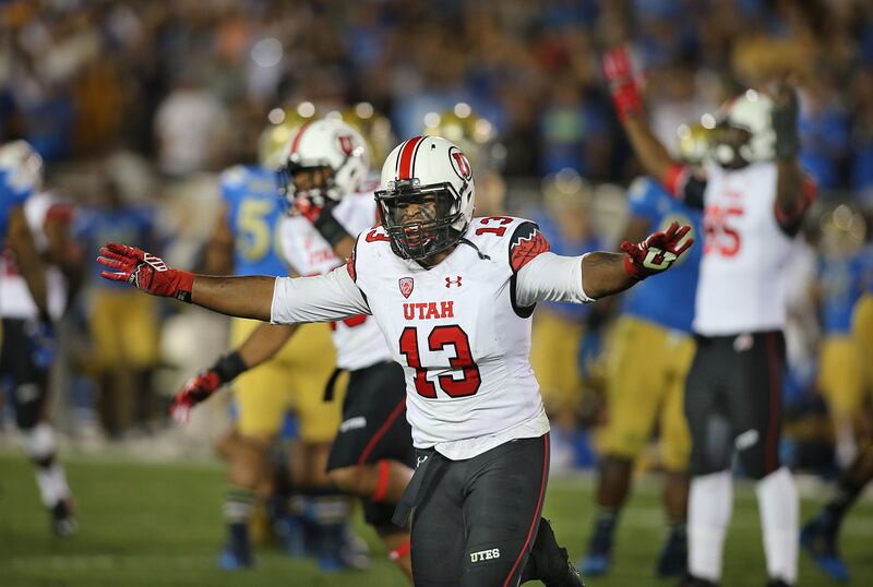 Utah Utes linebacker Gionni Paul (13) celebrates as the University of Utah defeats 8th ranked UCLA 30-28 in the Rose Bowl during NCAA PAC 12 football action Saturday, Oct. 4, 2014, in Pasadena.