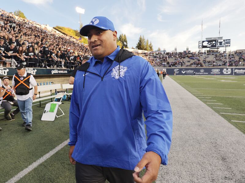 BYU coach Kalani Sitake walks the sidelines prior to a game in Logan on Friday Oct 1, 2021.