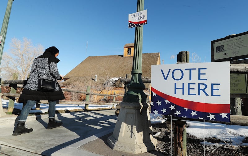 A Utah voter walks to the polls at Wheeler Farm in Murray on March 3, 2020.