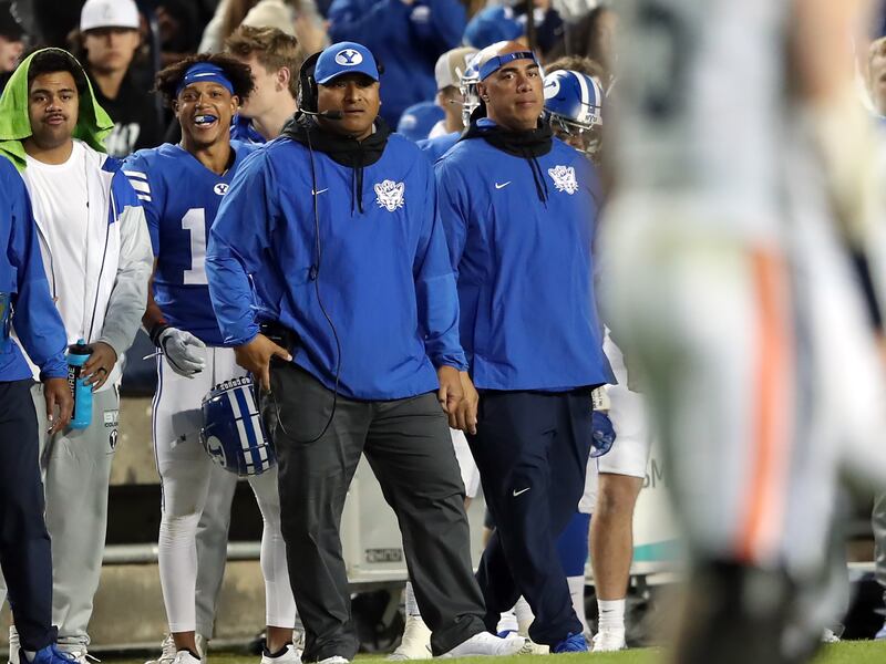 BYU coach Kalani Sitake watches from the sidelines as BYU and Virginia play at LaVell Edwards Stadium in Provo.