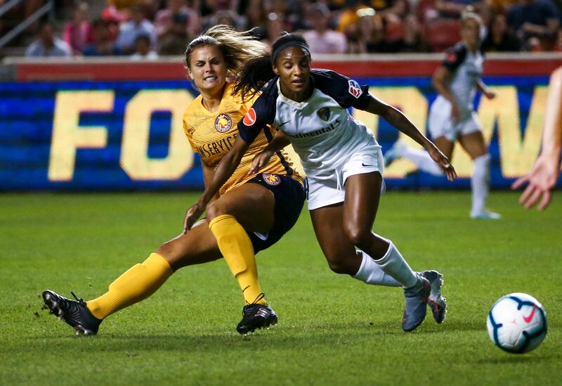 Utah Royals FC forward Katie Stengel (24) clears the ball away from North Carolina Courage forward Lynn Williams (9) during the second half of a National Women’s Soccer League match at Rio Tinto Stadium in Sandy on Saturday, July 27, 2019. The Royals fell