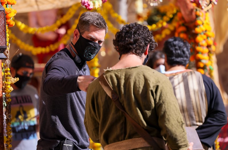 Director Dallas Jenkins talks with George Harrison Xanthis, who plays John, in the series, “The Chosen.”