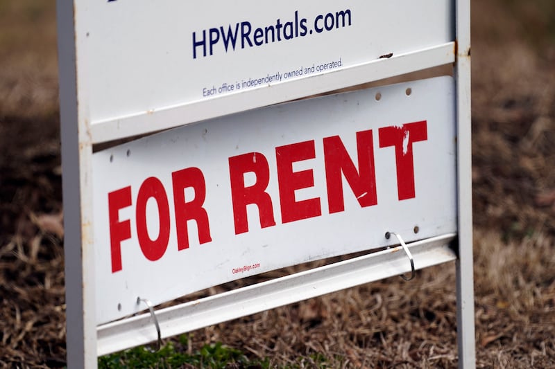 A “For Rent” sign is displayed along a neighborhood street in Mebane, N.C.