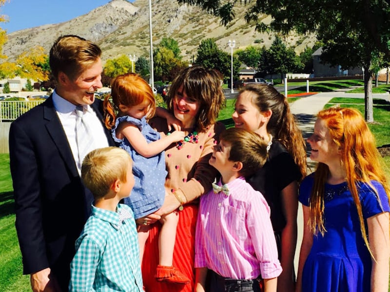 The Nielson family is photographed together after attending church.