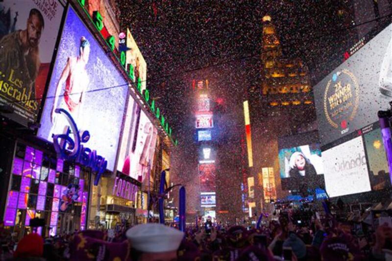 Confetti falls during the annual New Year’s Eve celebration in Times Square on Friday, Jan. 1, 2016, in New York. (AP Photo/Kevin Hagen)