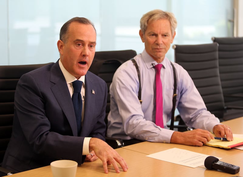 FILE - Better Boundaries co-chairmen Jeff Wright, left, and Ralph Becker talk to members of media in Salt Lake City on Thursday, July 20, 2017. Backers of Better Boundaries are busy raising money for what may be a $1 million campaign for the initiative cr