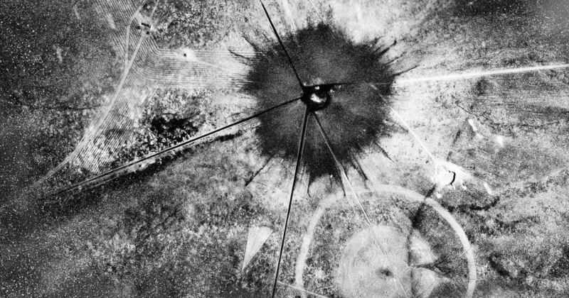 This photo shows an aerial view after the first atomic explosion at Trinity Test Site, in N.M., on July 16, 1945.