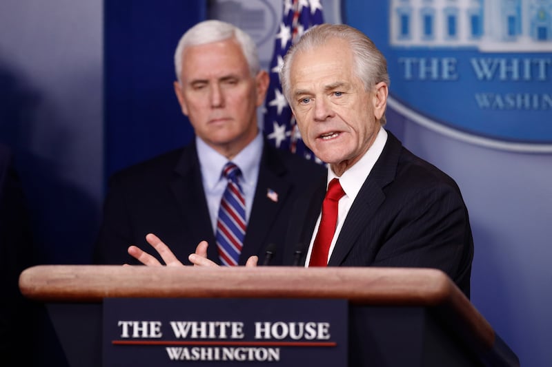 In this March 22, 2020, file photo, White House trade adviser Peter Navarro speaks during a coronavirus task force briefing at the White House, in Washington, as Vice President Mike Pence listens.