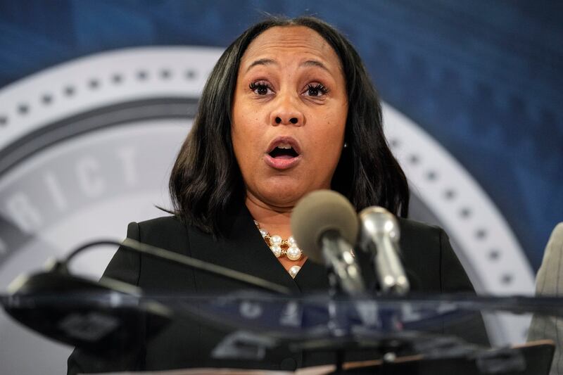 Fulton County District Attorney Fani Willis speaks during a news conference on Aug. 14, 2023, in Atlanta.