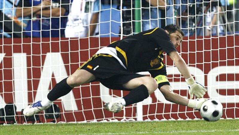 Spain's Iker Casillas stops a penalty kick by Italy's Antonio Di Natale during the shootout of the Euro 2008 quarterfinal match. Thanks in part to Casillas, Spain won 4-2 in the shootout to advance to the semifinals.