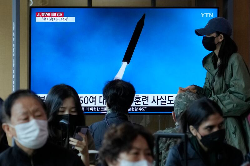 A TV screen shows an image of North Korea’s missile launch during a news program at the Seoul Railway Station.