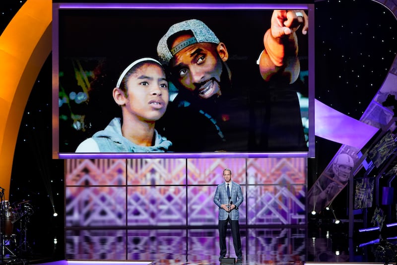 The city of Los Angeles will host a public memorial service for Kobe Bryant, his daughter Gianna and the seven others who died in a helicopter crash on Jan. 26 in Calabasas. In this photo, former NFL quarterback Peyton Manning pays tribute to Kobe Bryant and his daughter Gianna at the NFL Honors football award show Saturday, Feb. 1, 2020, in Miami. (AP Photo/David J. Phillip)