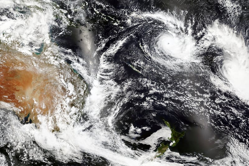 This Tuesday, Dec. 15 2020, satellite image released by NASA Worldview, Earth Observing System Data and Information System (EOSDIS) shows Cyclone Yasa, top center right, over Fiji. Fiji imposed a nationwide curfew Thursday, Dec. 17, 2020 after urging people near the coast to move to higher ground as the island nation prepared for a major cyclone to hit.