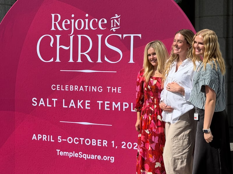 Women pose for a photo at a kickoff event for the 2027 Salt Lake Temple open house on Temple Square on Sept. 1, 2026.