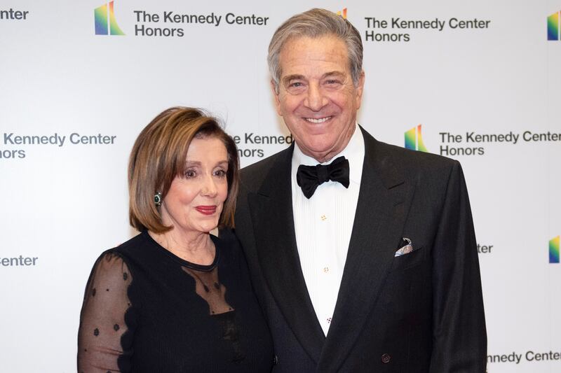 Speaker of the House Nancy Pelosi and her husband, Paul Pelosi, arrive at the State Department for the Kennedy Center Honors State Department Dinner in Washington.