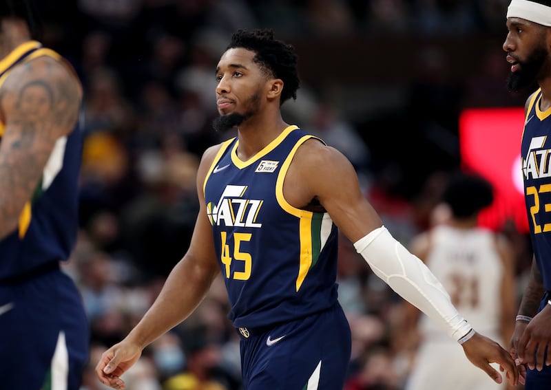 Utah Jazz guard Donovan Mitchell shows frustration as he walks to the bench during game at Vivint Arena in Salt Lake City on Wednesday, Jan. 12, 2022.