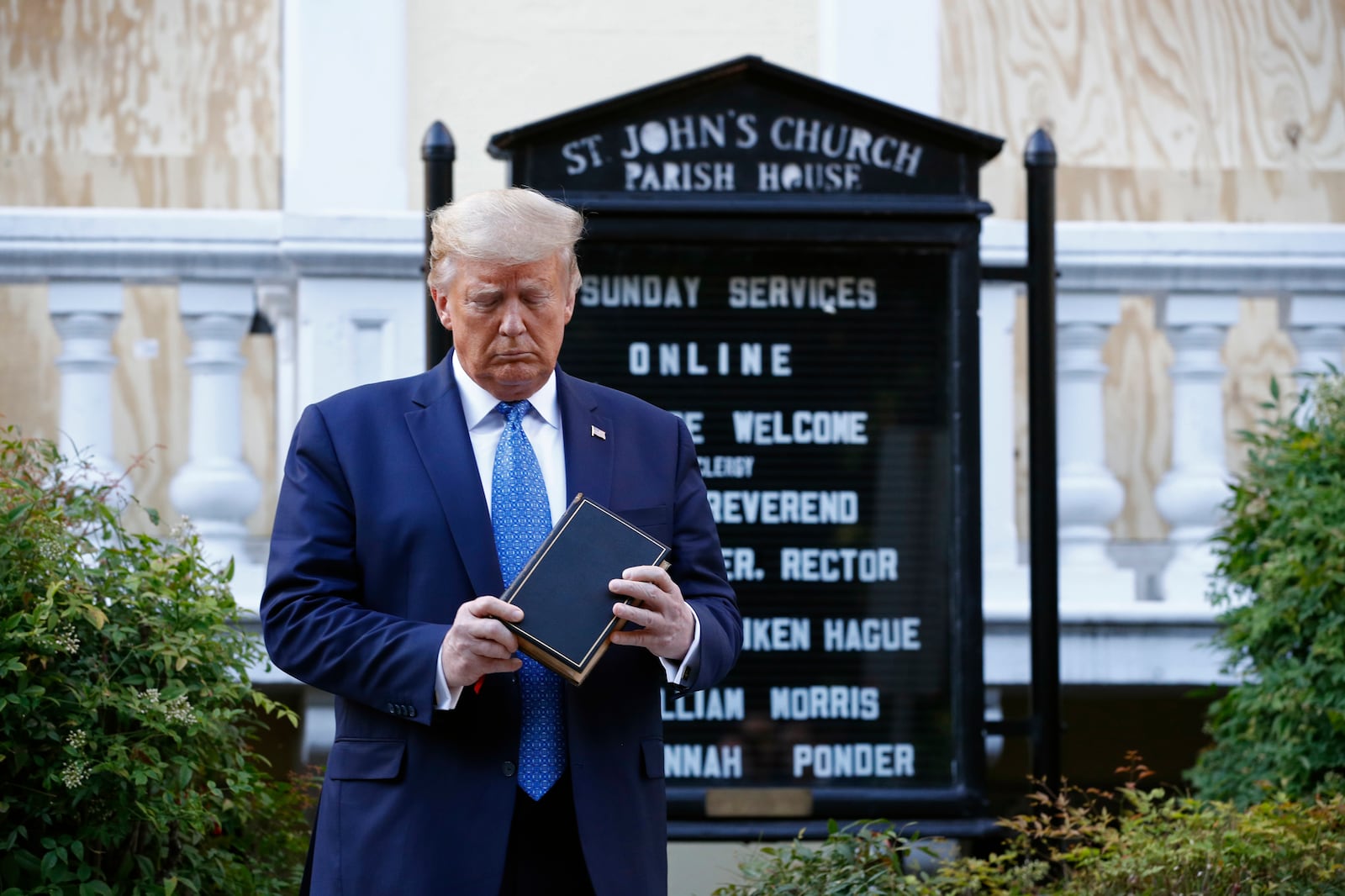 President Donald Trump holds a Bible during a visit outside of St. John’s Church across Lafayette Park from the White House.