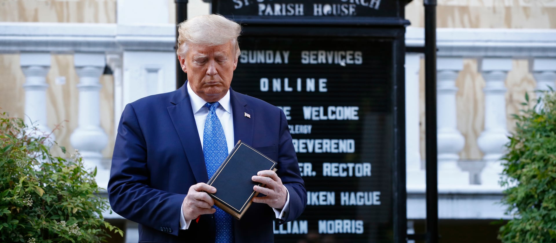 President Donald Trump holds a Bible during a visit outside of St. John’s Church across Lafayette Park from the White House.