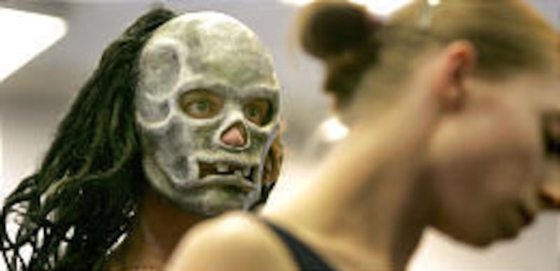 Jason Linsley creeps up behind Katherine Lawrence on Wednesday at a rehearsal of the Ballet West performance of "Ghost Dances."